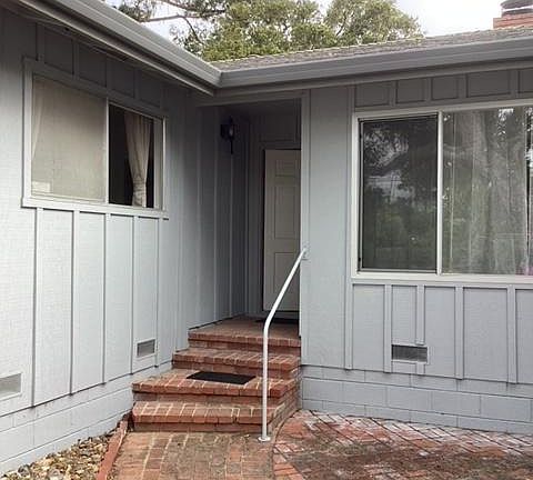Front entrance. Natural light for living room and East bedroom