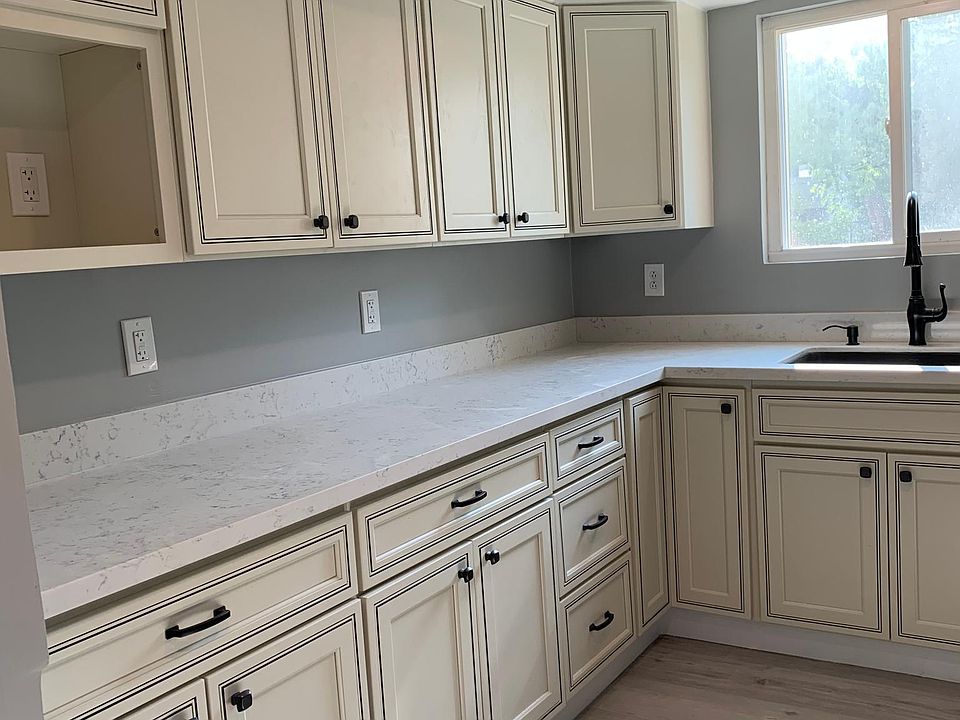 Updated kitchen with big window and ample counter space