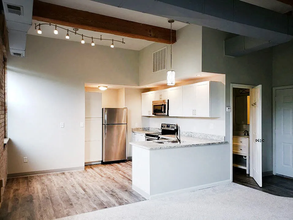 Hardwood-Style Flooring and Unique Lighting Fixtures