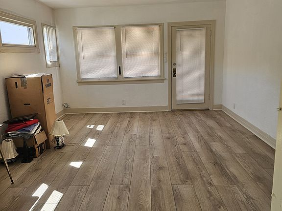 Living room with front door access