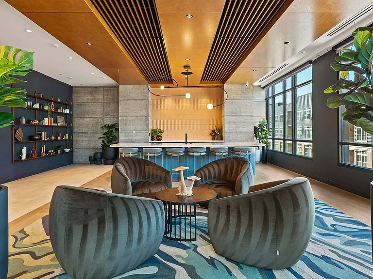 Unwind in a spacious lounge with a cozy sofa and sleek coffee table.