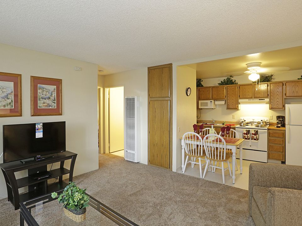 One bedroom Living area with furnishings plus we've included all the extras such as a Flat Screen TV, DVD player, plates, dishes, flatware, ironing board and blankets, towels and linens for your bedroom and bath, plus lots more!