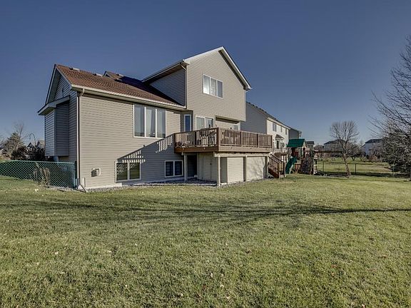 Nice size fenced in corner lot with a large maintenance free deck for entertaining