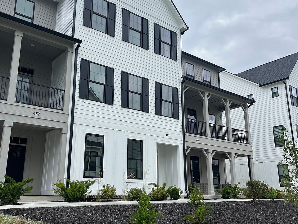 Gorgeous front entry with green space
