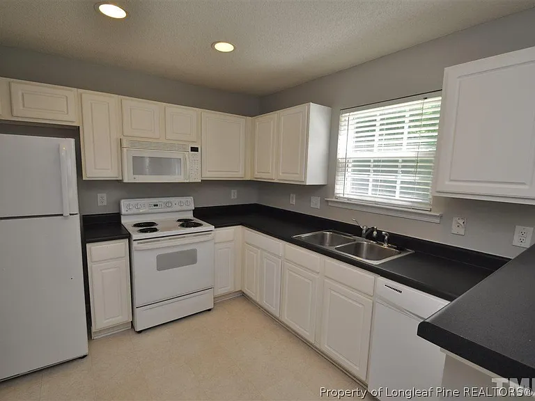 5909 Rivercliff Ct — Photo 8