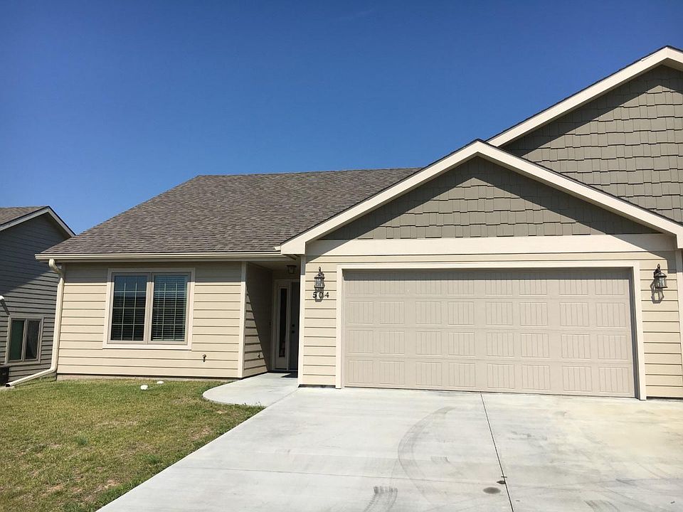 Front with 2 car garage.