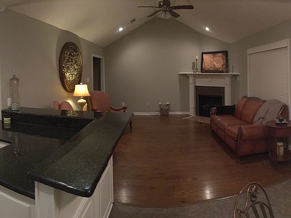 Corner gas log fireplace