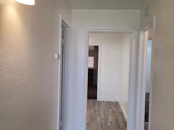 Entry hall with laminate flooring.