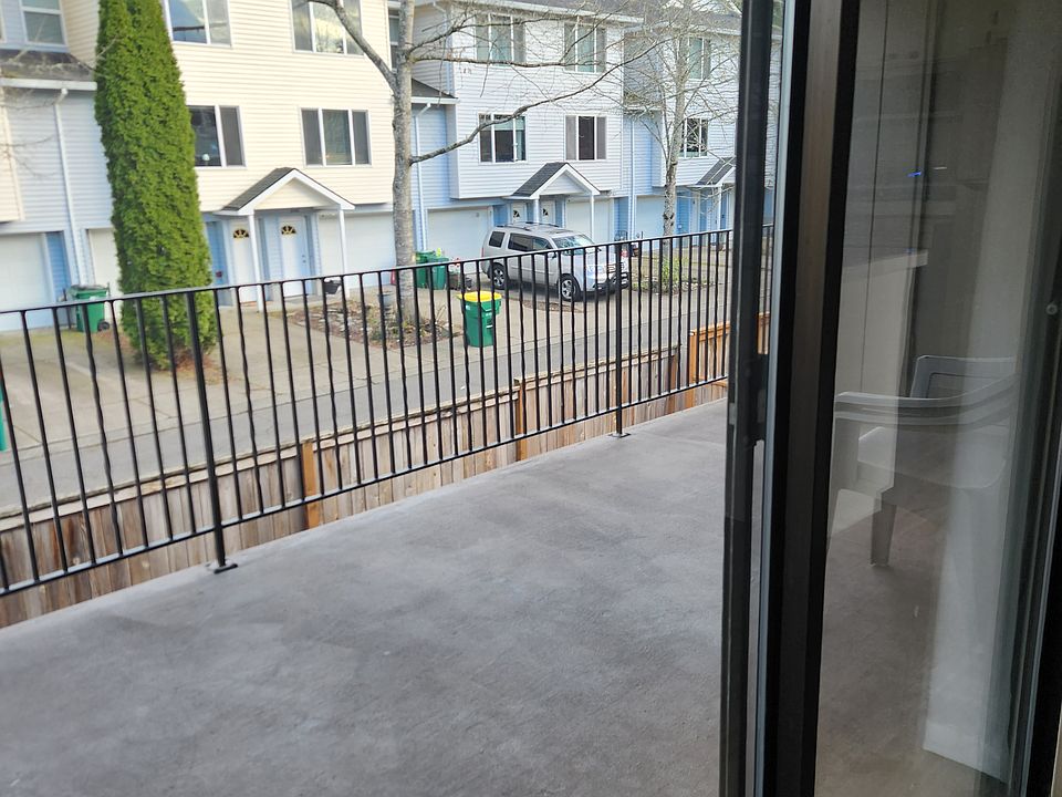 Covered deck off of kitchen and dining room.