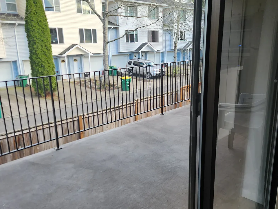 Covered deck off of kitchen and dining room.
