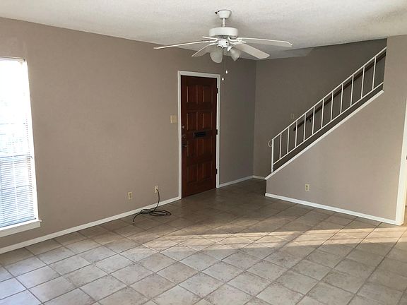 Front door, and stairway to bedrooms upstairs