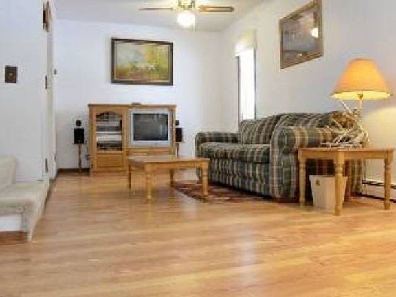 Spacious living room (26x11) view from the front entry.