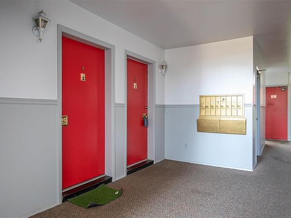 Interior entrance. Laundry room is just steps from the condo, located behind the mailboxes.