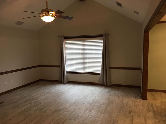 Large family room with vaulted ceiling