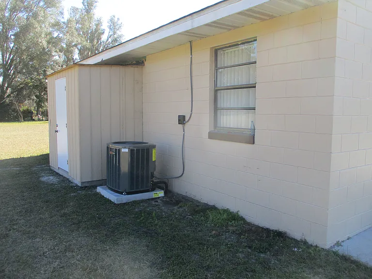 Washer and dryer in utility room out back. New central Ac