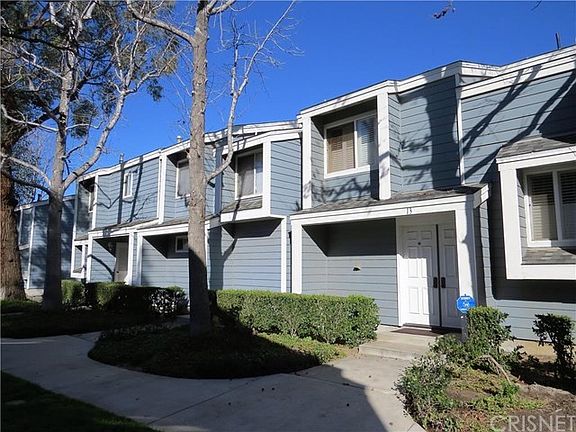 Unit #13 with it's double door entry leads into a tastefully decorated home.