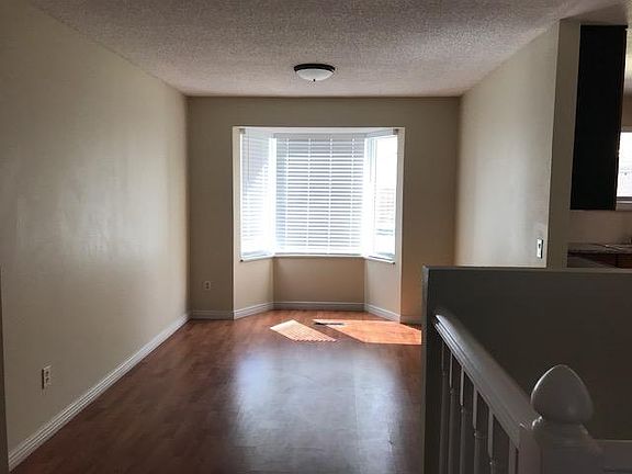 Dining area, hardwoods and bay window
