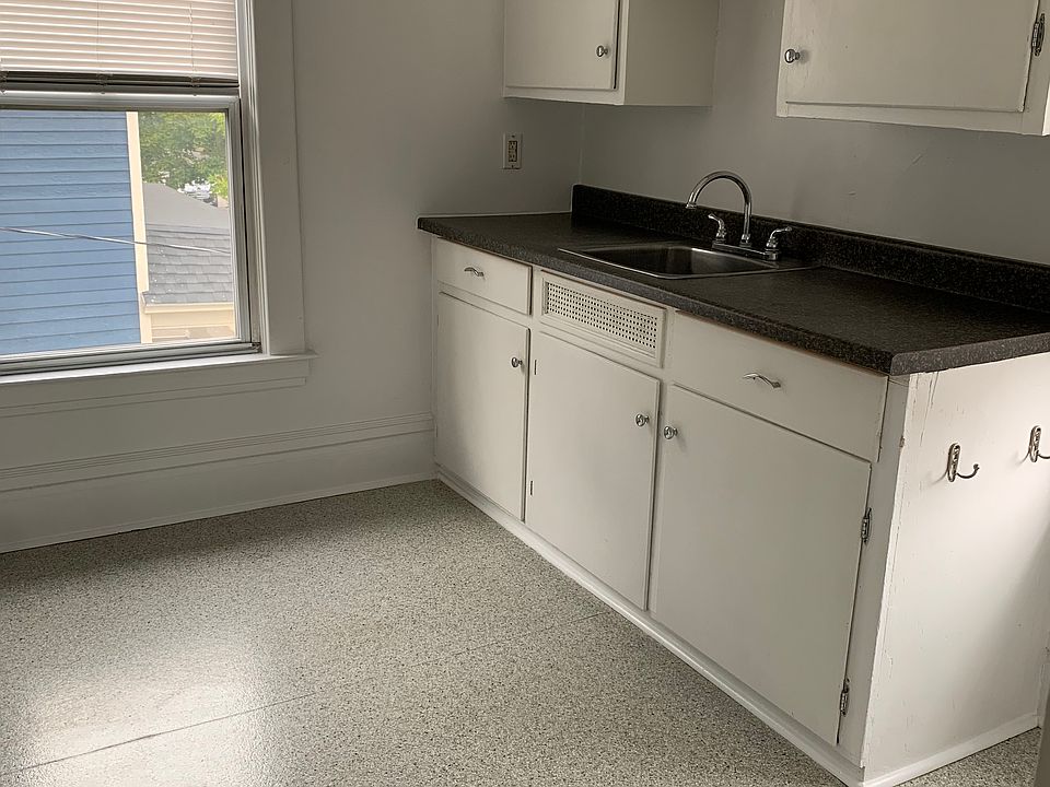Kitchen cabinets, lots of storage.