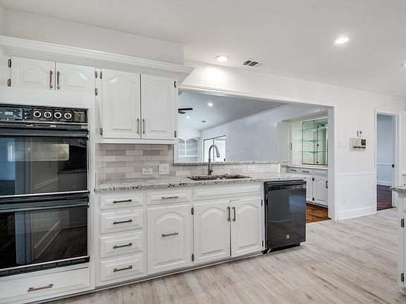 New counters, backsplash, new floors and NEW appliances!