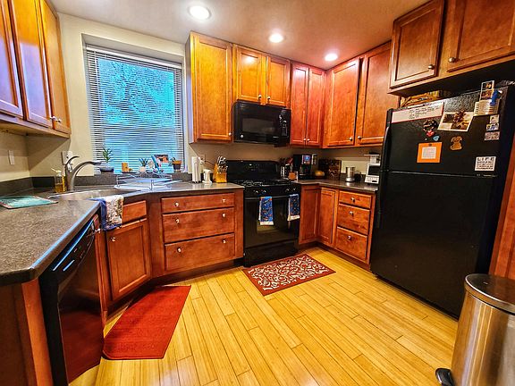 The kitchens sits directly behind the dining room and also opens into the family room.
