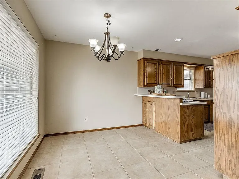 Breakfast nook adjacent to kitchen.