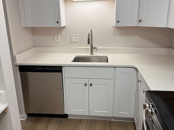 New countertops and a deep sink provide plenty of cooking space.