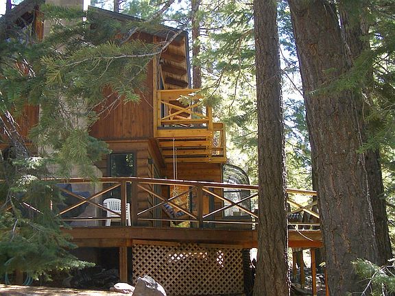 Side View with Decks off bedrooms and Living Room