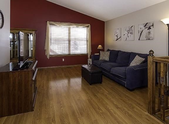 Upper level living room, with hardwood floors throughout