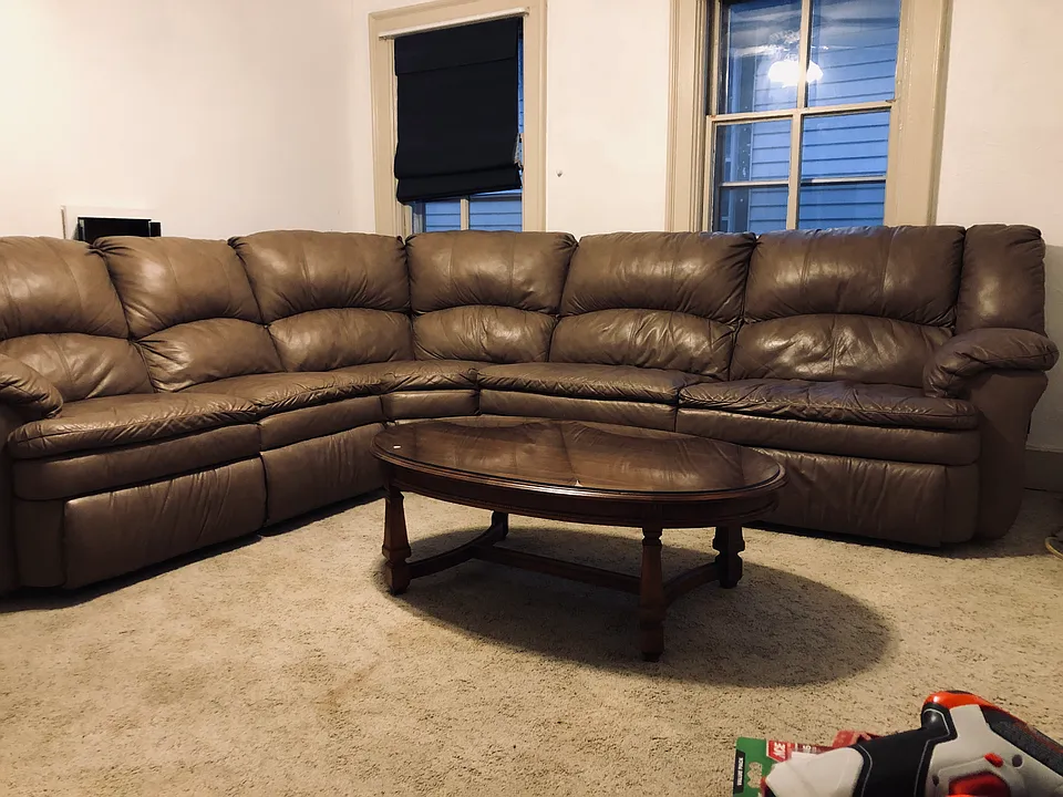Furnished Leather Sectional and Coffee Table