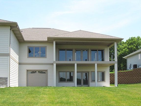 Back View with Golf Cart/Storage Shed