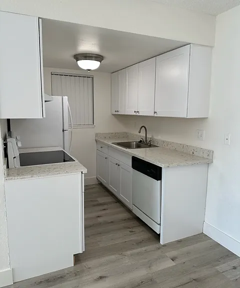 Remodeled kitchen with granite countertops and energy efficient appliances