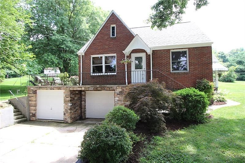 Gorgeous 3 Bedroom Brick House w/ 2 Car Garage and Stone Front