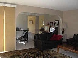 looking from the livingroom towards the dinning room and kitchen enterance