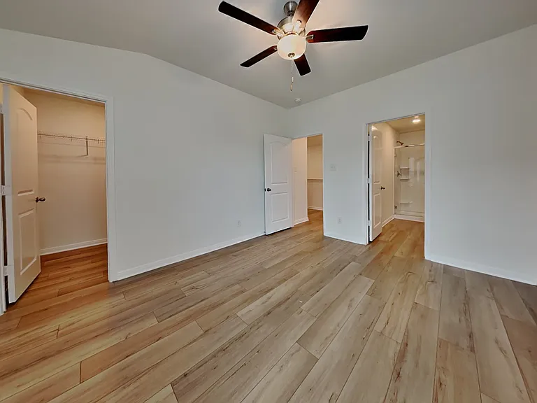 Brightly lit, spacious room wi