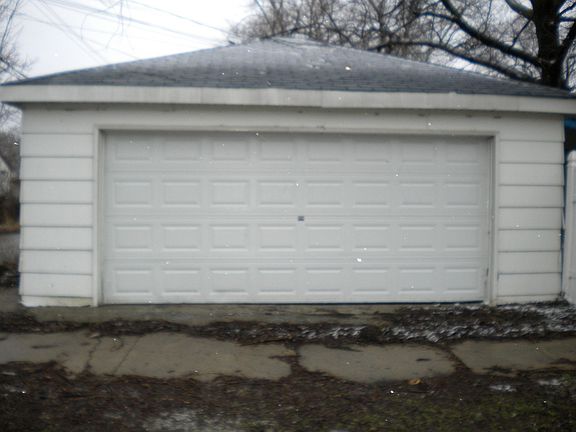 Garage at rear of home