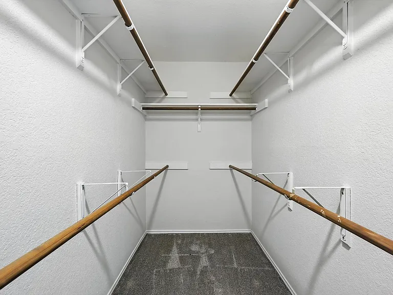 Closet in primary bedroom