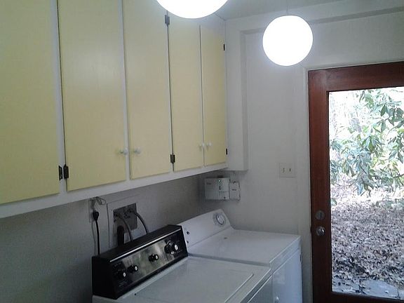 Laundry Room with washer dryer and utility sink