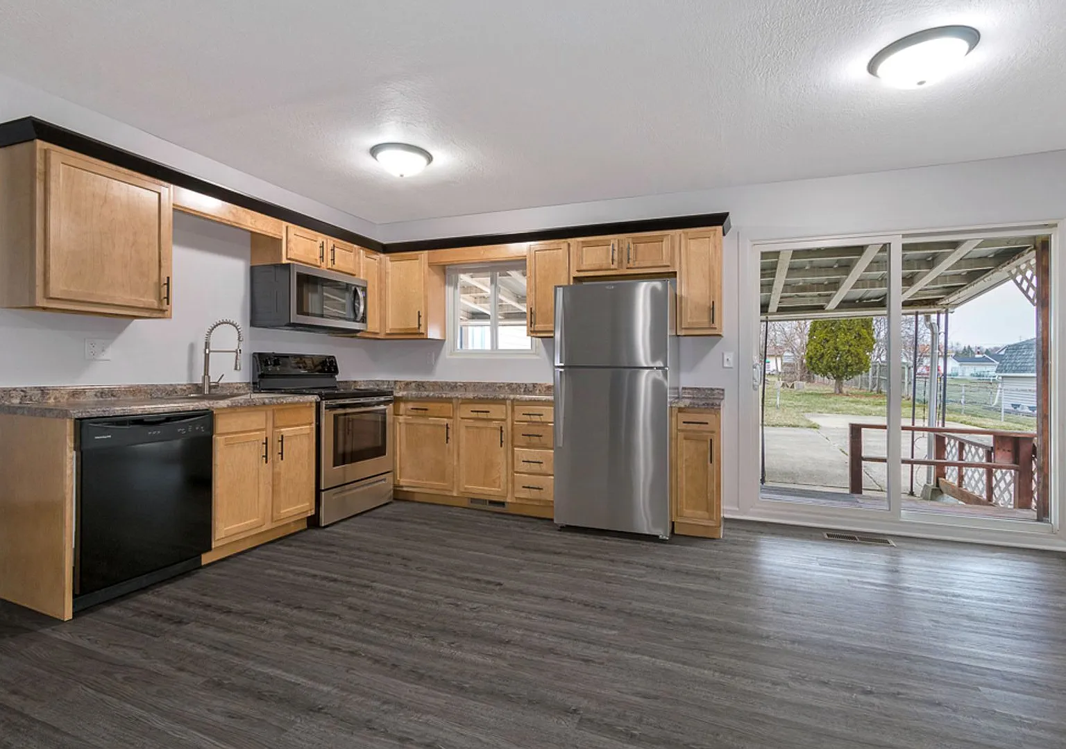 Single Story Home 3BR, 1.5BA equipped with massive workshop space! - 3427 30th St NE — Photo 4