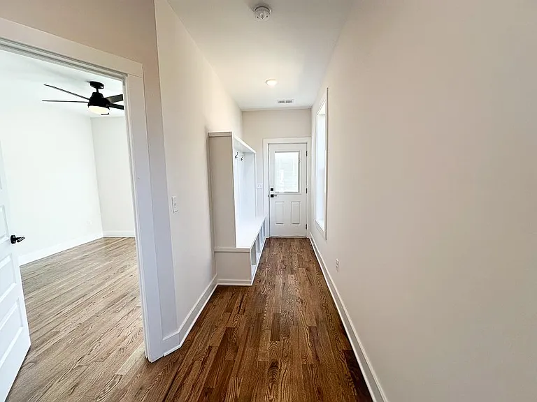 Back door on ground level with built in lockers