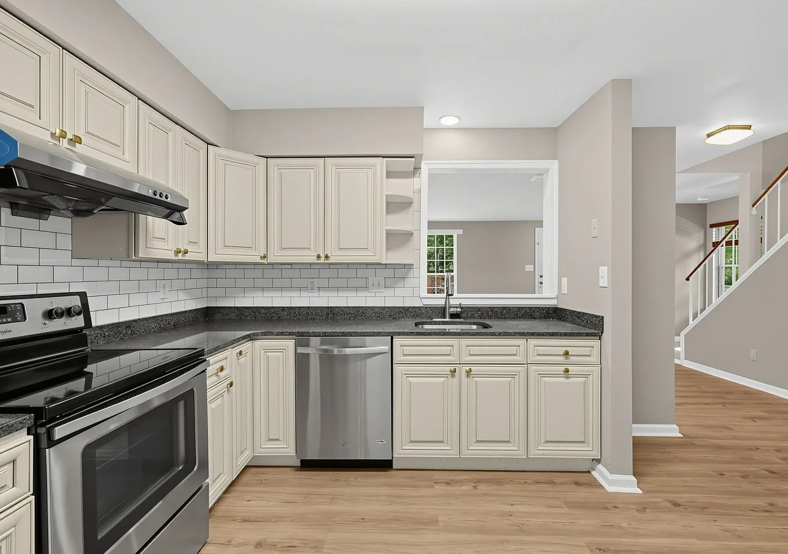 Bright End-Unit Home with Private Top-Floor Primary Suite — Photo 4