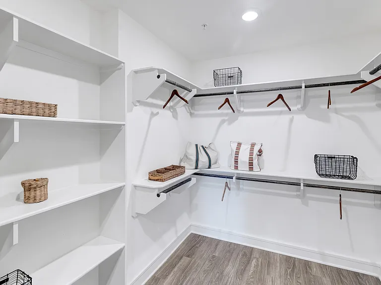 Custom-designed walk-in closets with ample storage