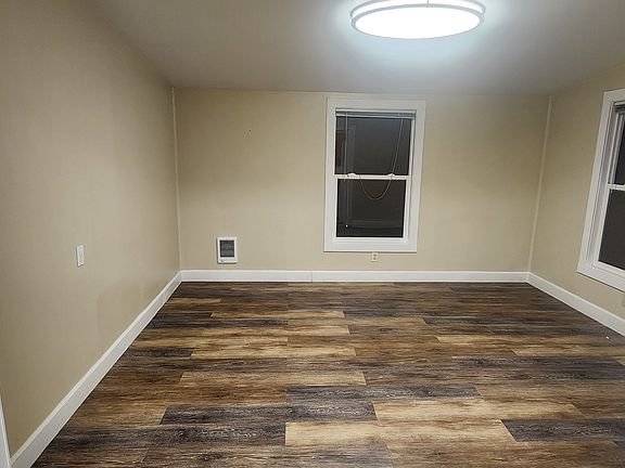 Side Living Room - there are 2 living spaces. One on side of home and one in front of home.