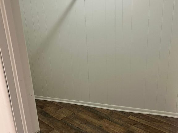 walk-in closet with plenty of space for clothing, shoes, and storage.
