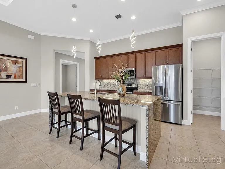 9318 SW Miracoli Way — Photo 21