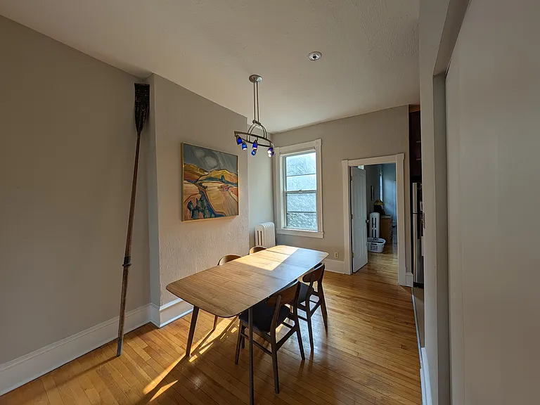 dining area from living room, lots of natural light