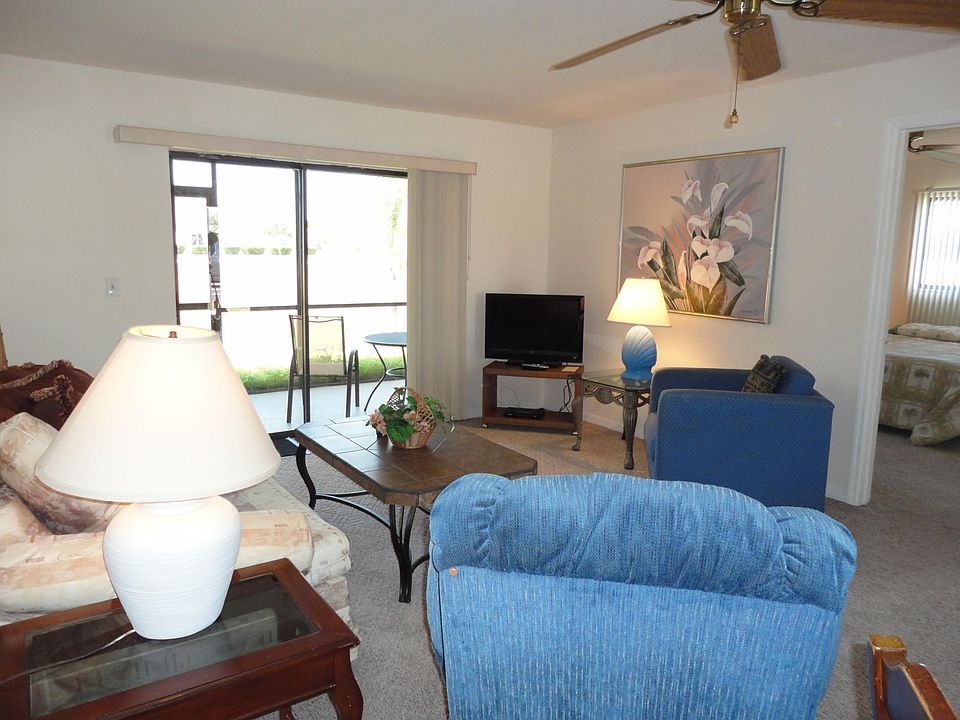 Other view of Living Room looking out at screened patio.