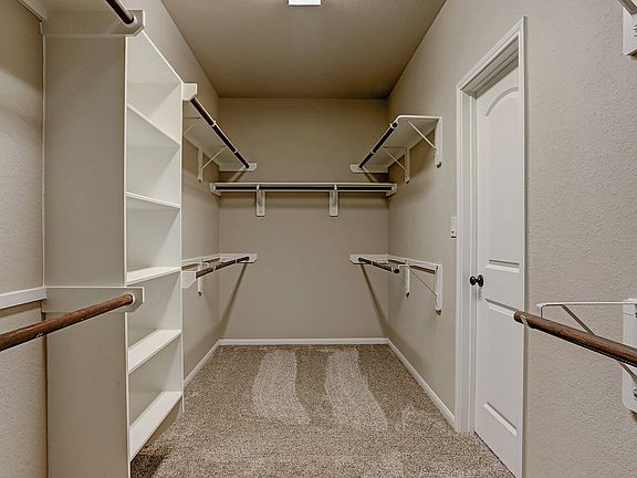 Spacious owner s walk-in closet