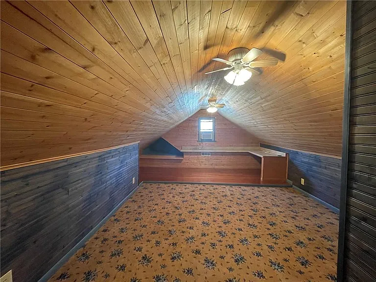 Great Space for Study or Quiet Time with Built-In Desk. Area could also be used as a third bedroom.