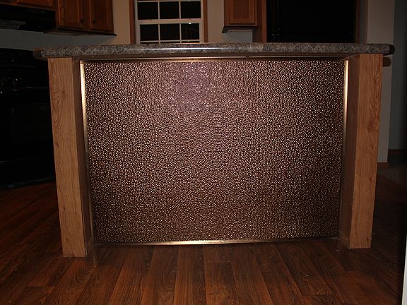 Kitchen island with copper