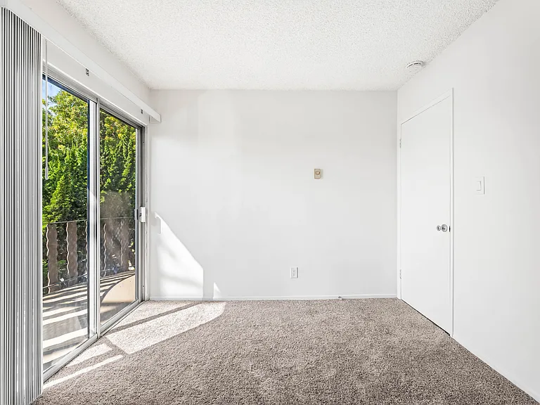 Street-view bedroom with private balcony